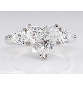 Three heart deals diamond ring